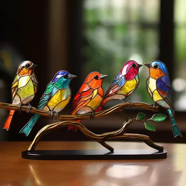 Kleurrijke glazen vogels interieur